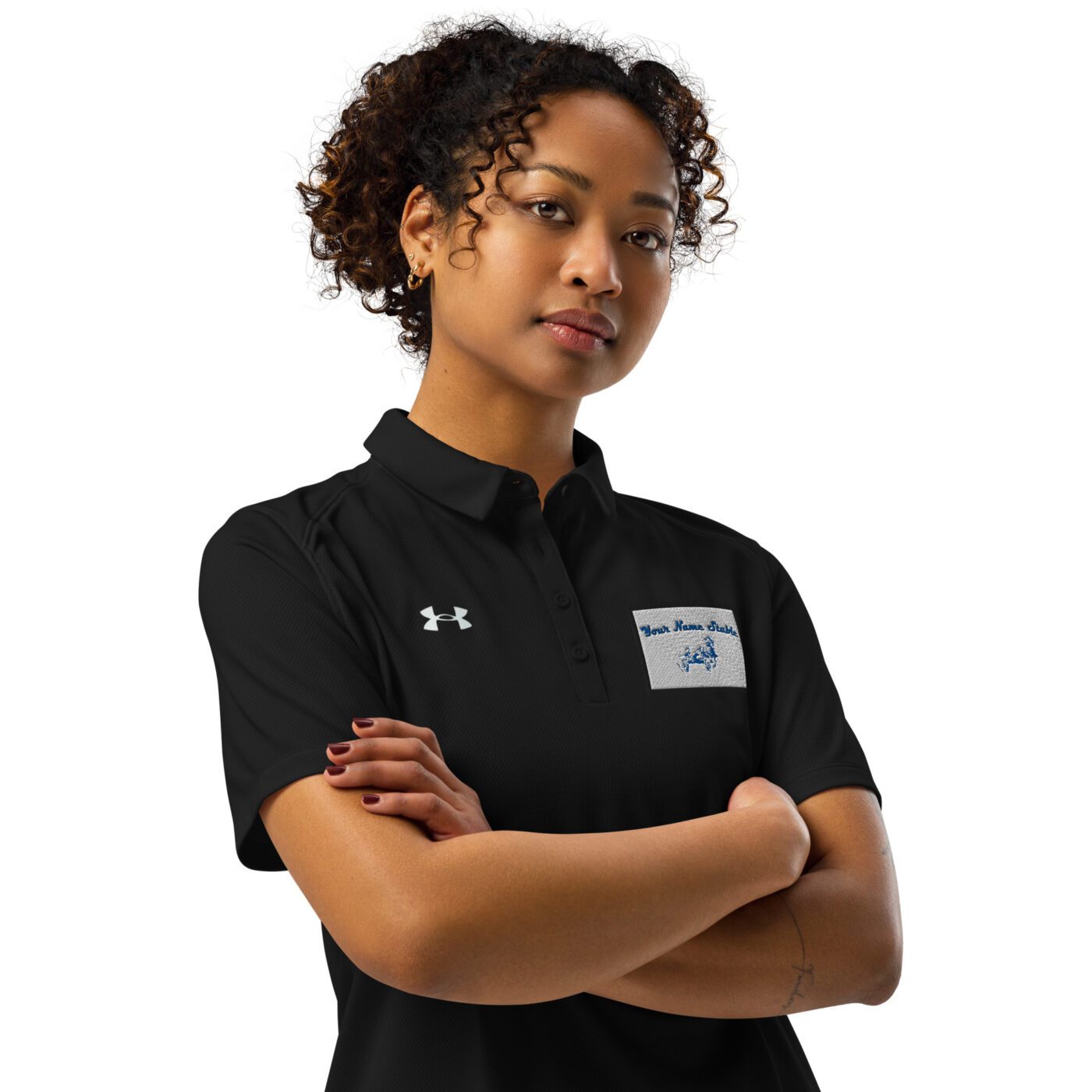 A woman in black shirt with arms crossed.
